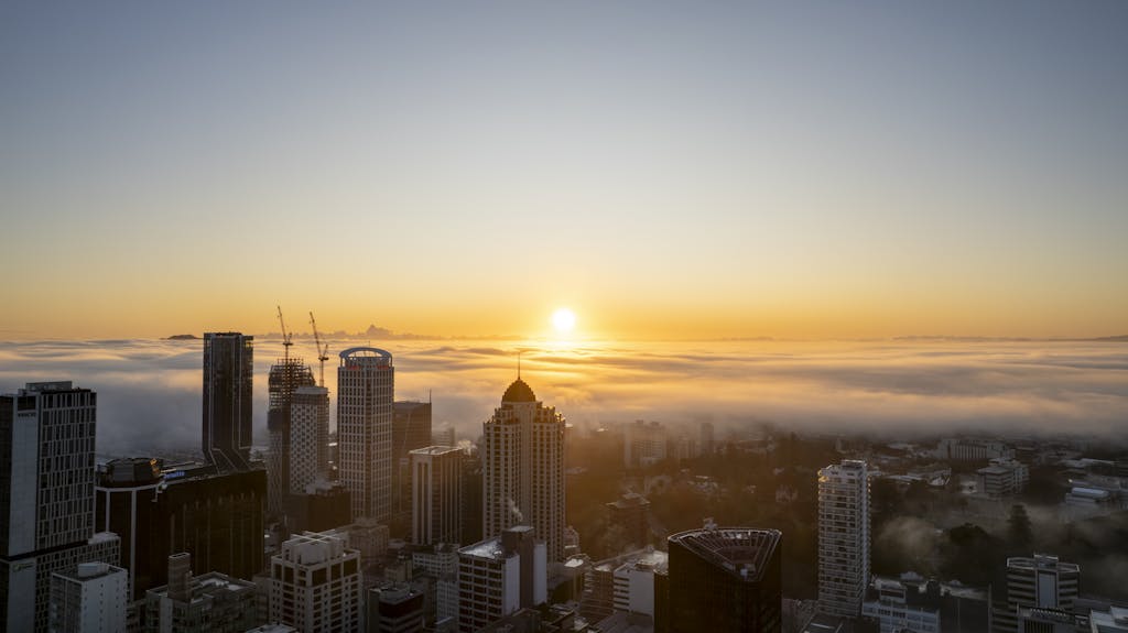 City Downtown at Foggy Sunrise